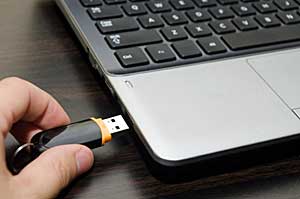 Flash drive plug n for mobile listening